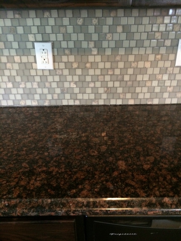 granite counyertops & tile backsplase